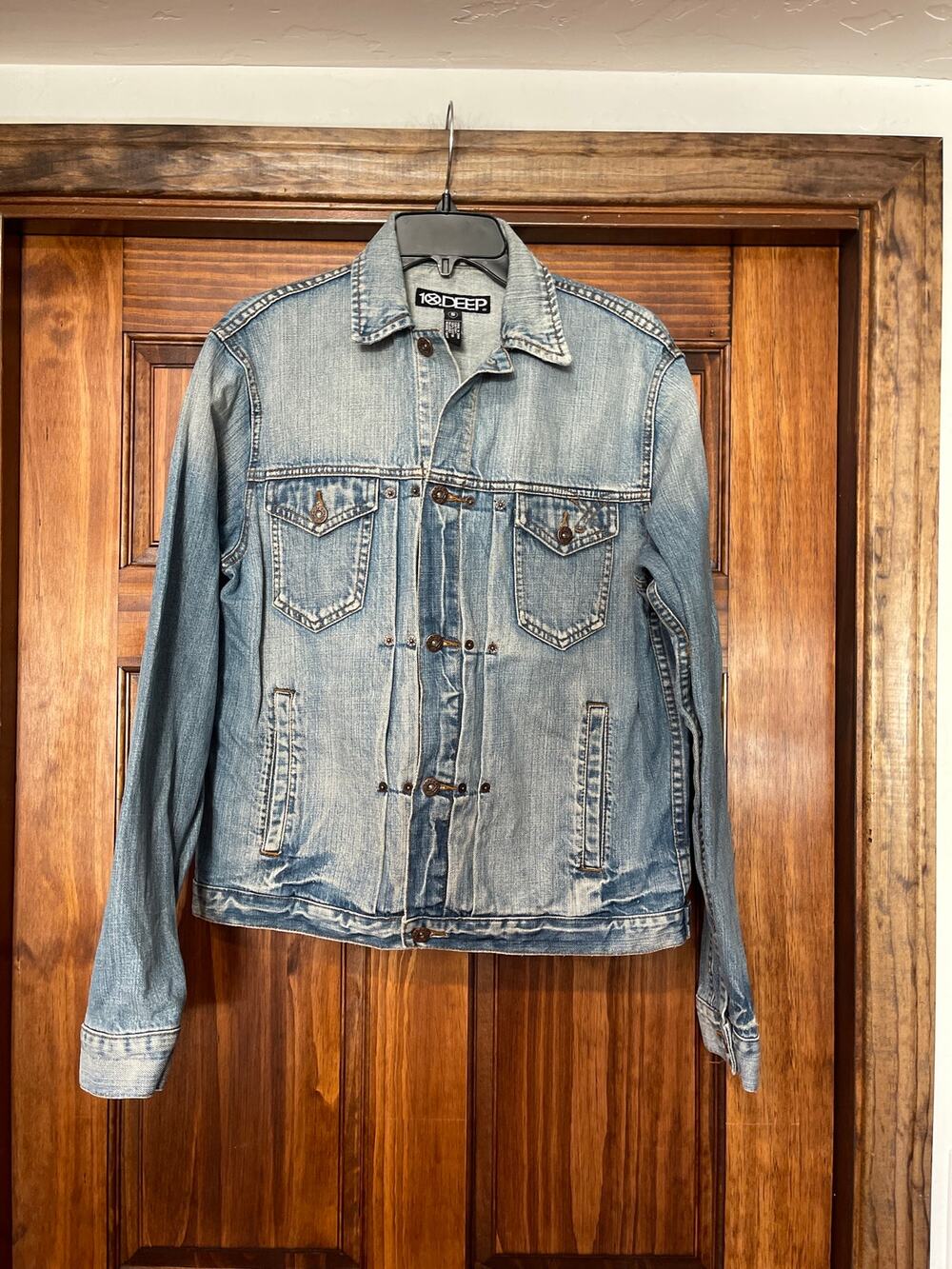 10.Deep light-wash denim trucker jacket Small